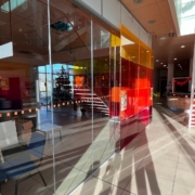 glass partitioning system with glass door